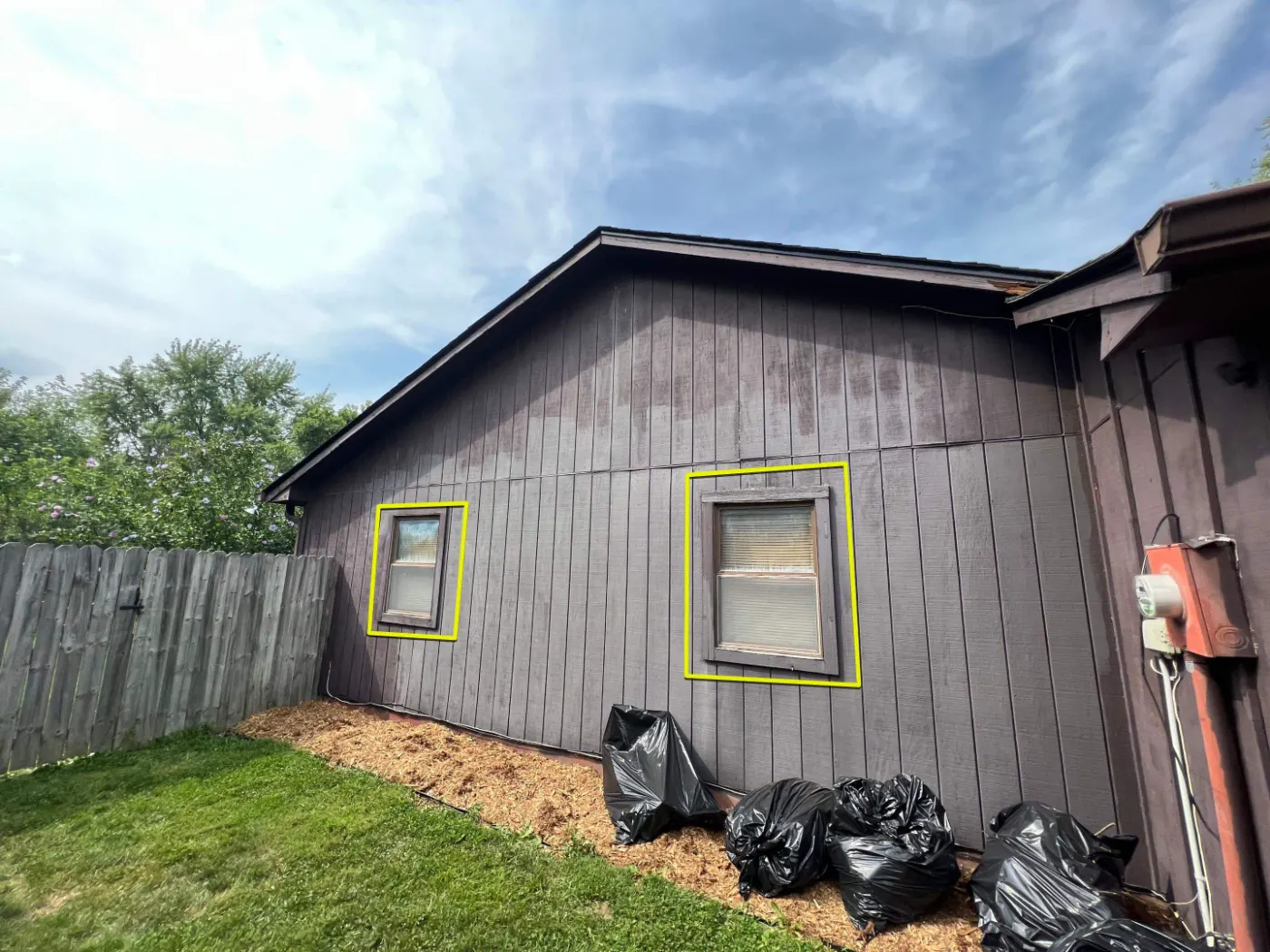 Storm-damaged window documented in Crooked Creek